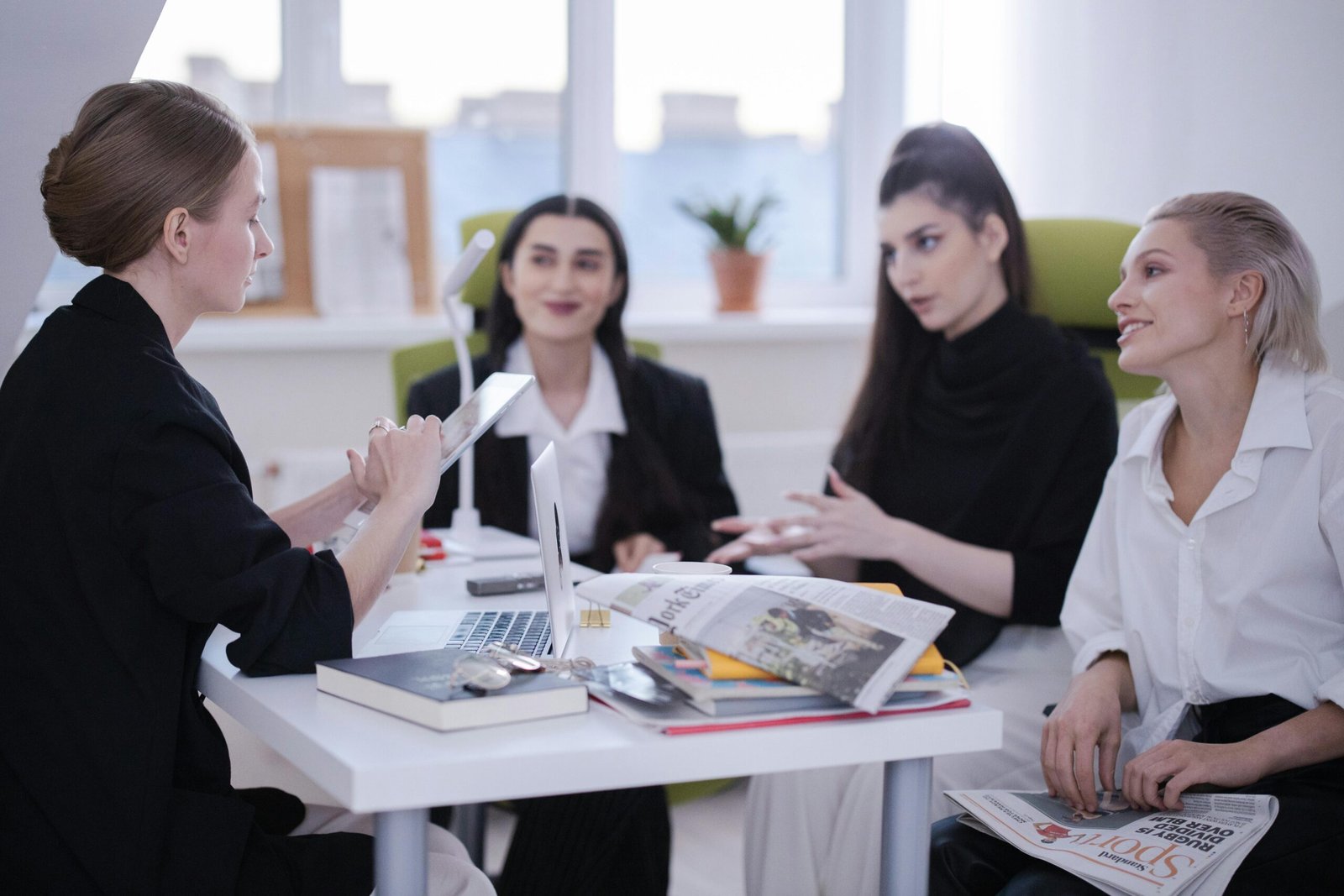 team of professionals having a brainstorming session in a meeting