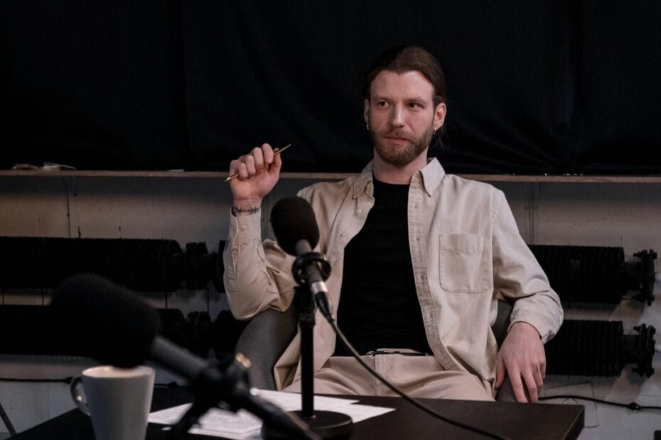 Image of a man with studio microphone on a stand