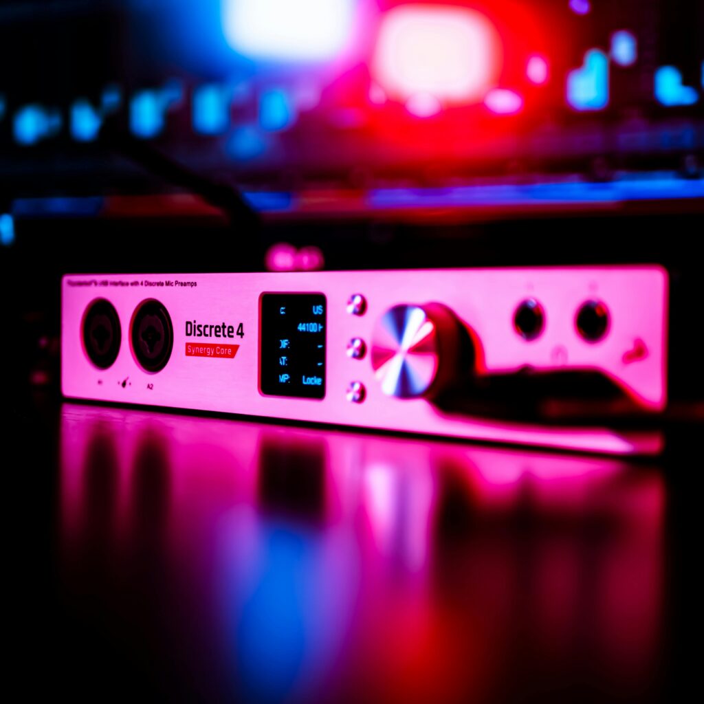 audio interface with multiple inputs and pink backlighting