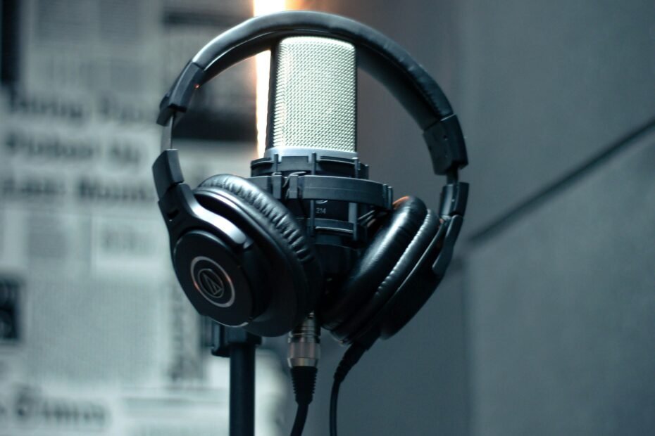 headphone placed above a condenser microphone